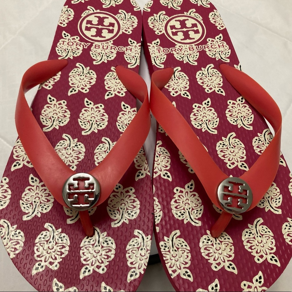 Tory Burch - deep pink flip flops / silver metal logo